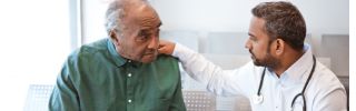 cardiac services Cardiologist speaking with elderly male patient